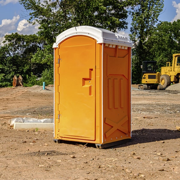 how often are the portable restrooms cleaned and serviced during a rental period in Spout Spring